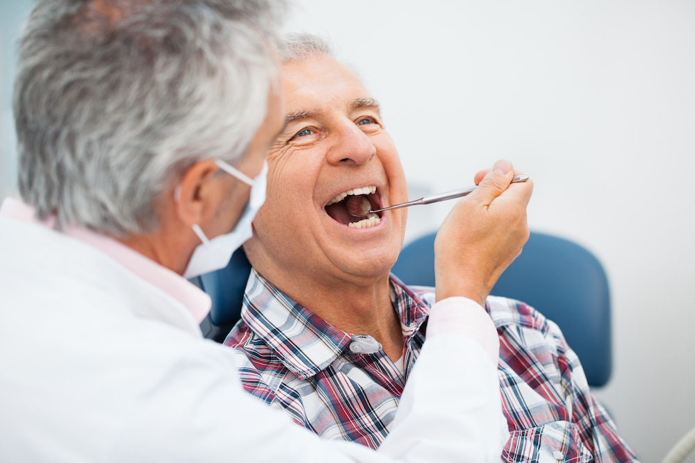 Senior man at the dentist